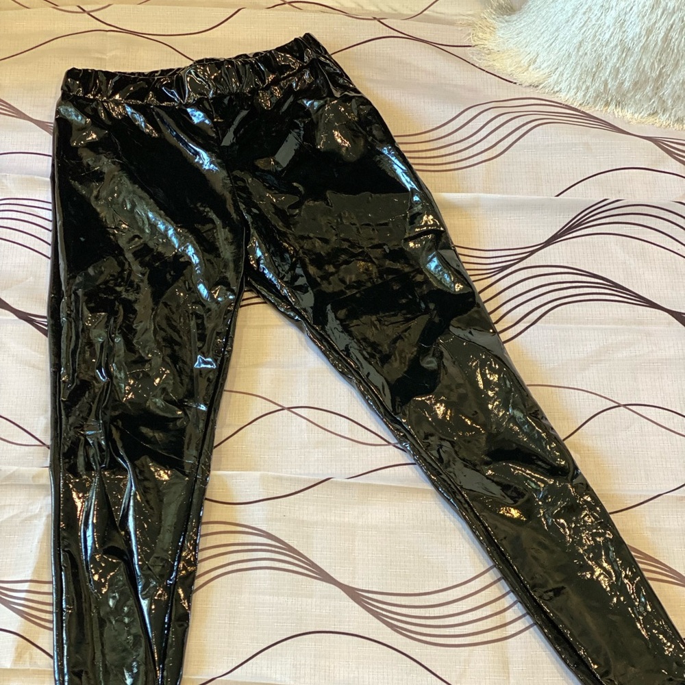 Puffer jacket and pants PVC material. All proceeds are going towards charity